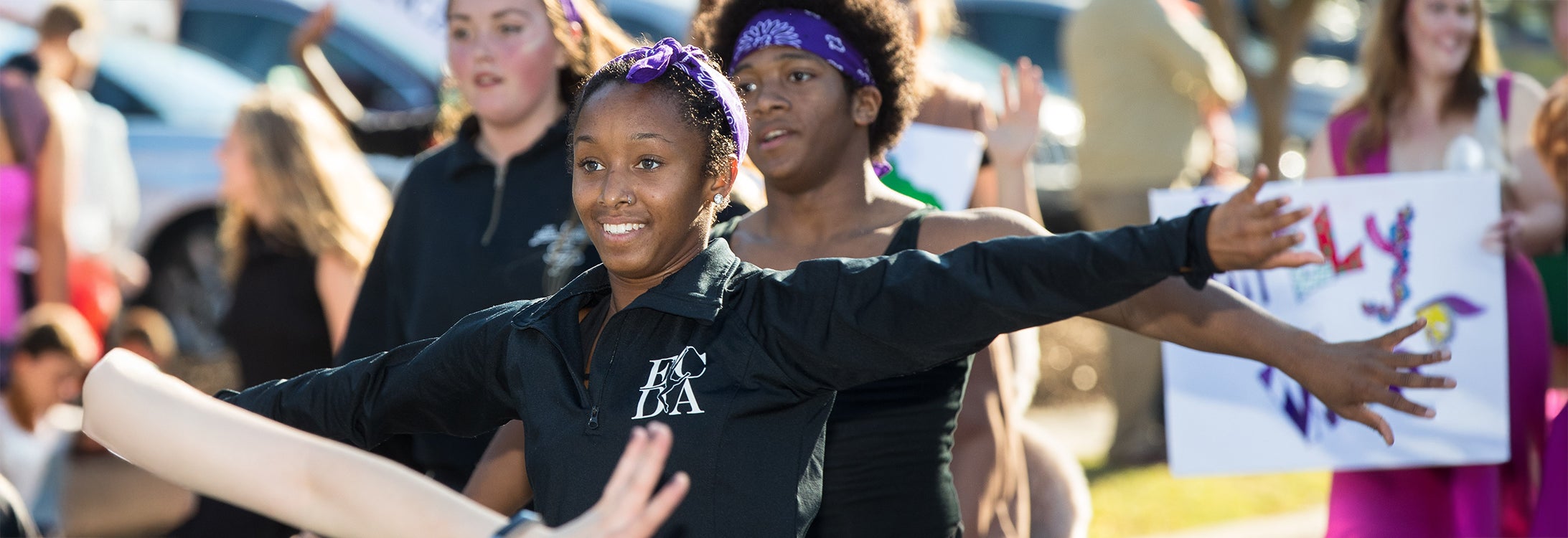 People attending and performing in a parade